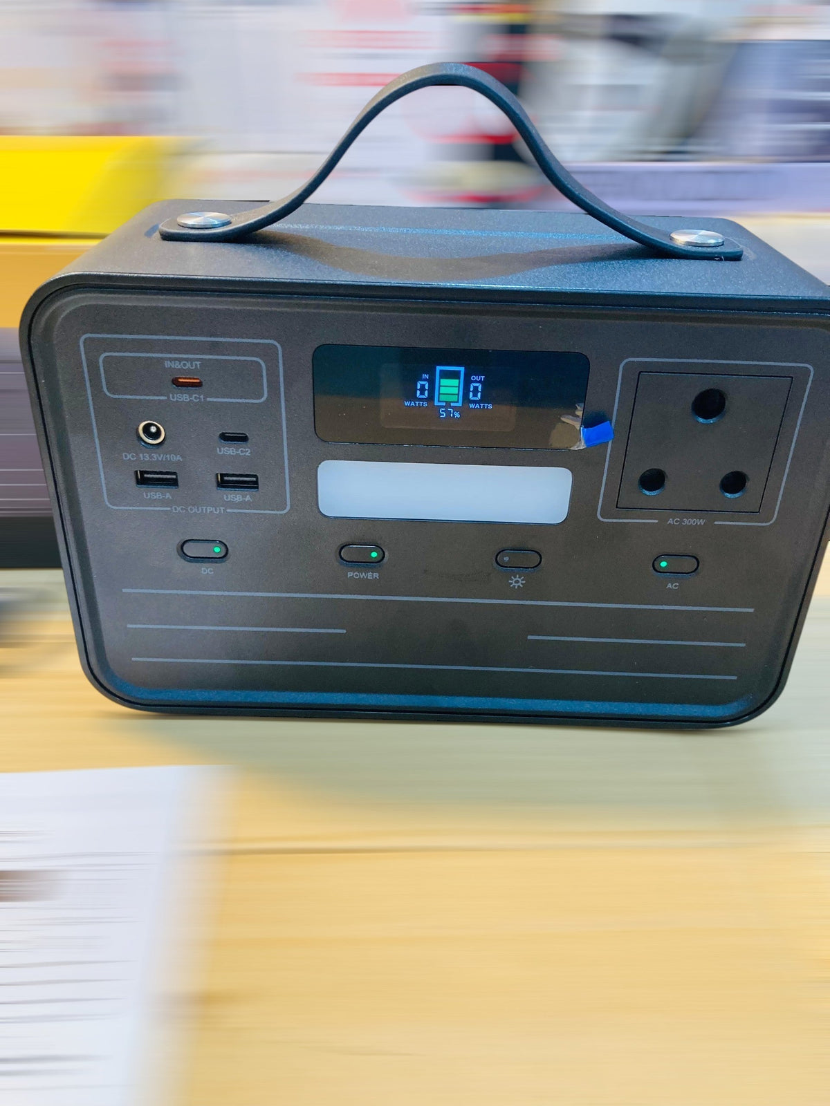 Portable 300 Watt AC/DC Power Station with Digital Display and Integrated Handle A41029